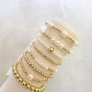 Handmade Royal Gold Beaded & Pearl Cluster Bracelet Stack – 8-Piece Set - Image 4
